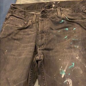 Distressed jeans with paint detail